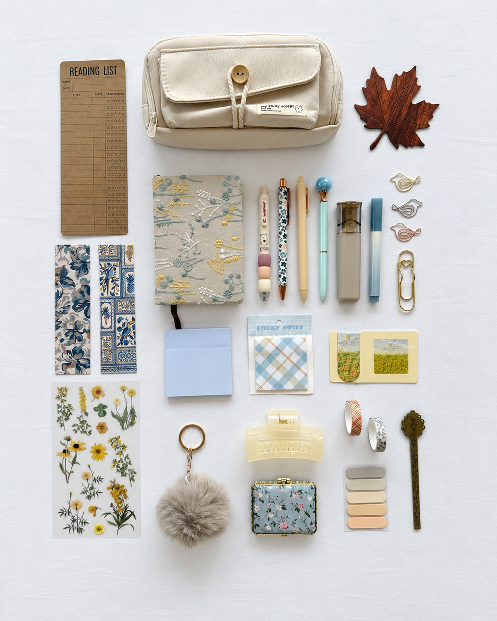 Harvest Light neutral fall stationery collection with a journal, writing tools, bookmarks, sticky notes, and seasonal desk accessories. Product photo 1 of 4.