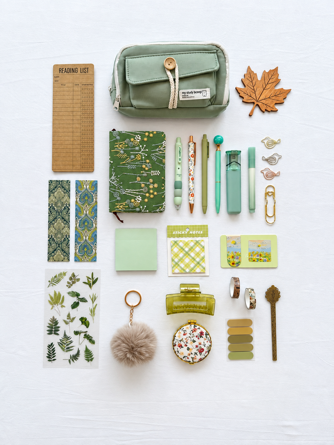 Meadow Glow green fall stationery collection with a journal, writing tools, bookmarks, sticky notes, and seasonal desk accessories. Product photo 1 of 4.