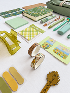 Meadow Glow green fall stationery collection with a journal, writing tools, bookmarks, sticky notes, and seasonal desk accessories. Product photo 3 of 4.