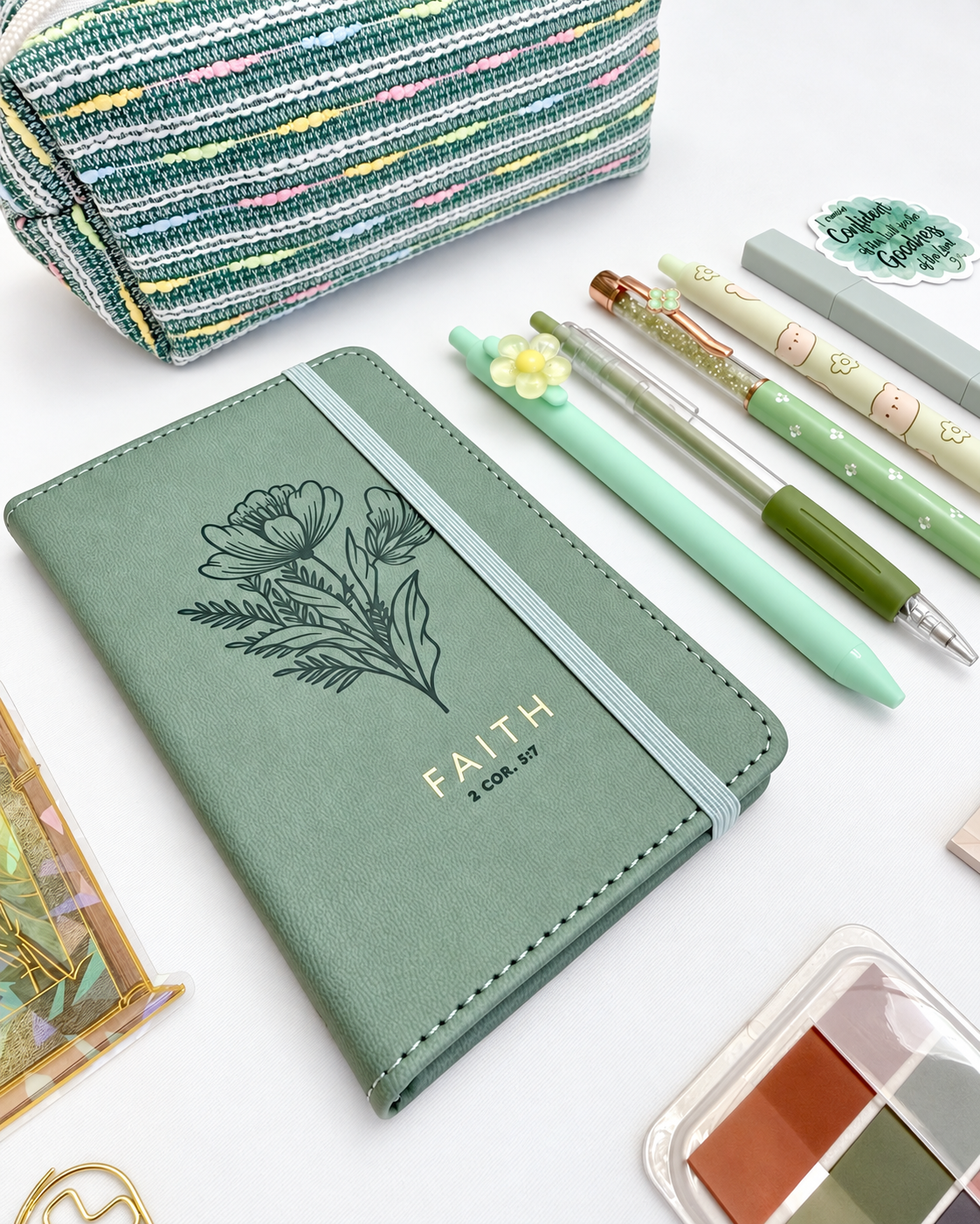 Faith green Christian stationery collection with a Scripture journal, writing tools, bookmarks, washi tape, and Bible study accessories. Product photo 2 of 4.