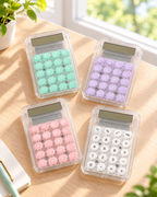 Pastel desktop calculator with colorful buttons and a clear display for home, office, or study. Product photo 1 of 5.