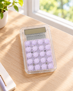 Pastel desktop calculator with colorful buttons and a clear display for home, office, or study. Product photo 2 of 5.